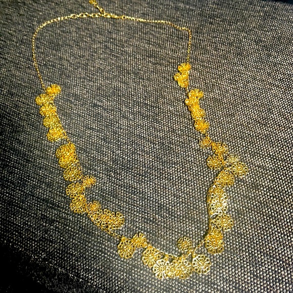 Long goldtone necklace with dangling charms - Picture 1 of 4